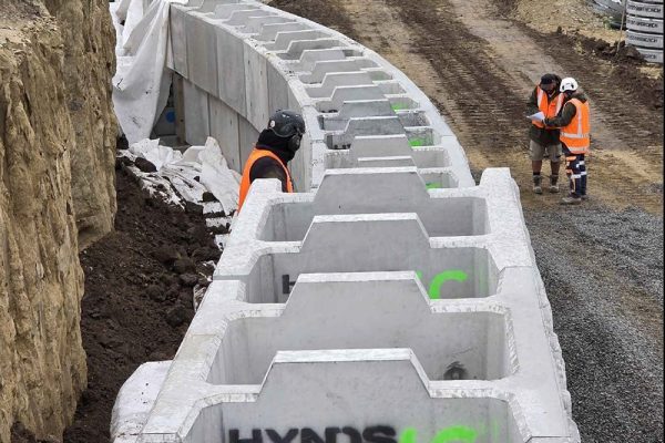 Hynds Hyblocks allow for a curve radius. See the tech guide for more detail