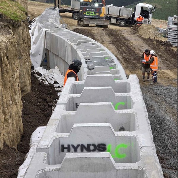 Hynds Hyblocks allow for a curve radius. See the tech guide for more detail